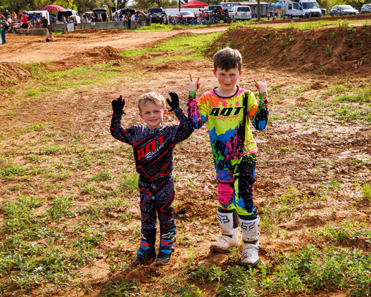 MOTOCROSS KIDS PLAY IN THE MUD